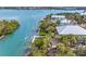 Picturesque aerial perspective of a coastal home with a private dock and beautiful waterfront access at 79 Palm Dr, Placida, FL 33946