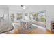 Dining area with seating for six and access to the screened-in porch at 79 Palm Dr, Placida, FL 33946
