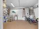 Well-organized garage space with ample storage shelves and room for bikes at 79 Palm Dr, Placida, FL 33946