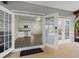 Bright living area with sliding doors, connecting indoor and outdoor spaces seamlessly at 79 Palm Dr, Placida, FL 33946