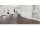 Spacious room featuring a wet bar, sleek flooring, a full bathroom and access to outside at 79 Palm Dr, Placida, FL 33946