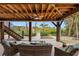Outdoor patio area offering comfortable seating and beautiful views of the surrounding landscape at 79 Palm Dr, Placida, FL 33946