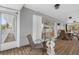 Secluded porch with seating area overlooking the interior of the home at 79 Palm Dr, Placida, FL 33946