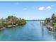 Beautiful waterfront view with private docks and lush greenery at 79 Palm Dr, Placida, FL 33946