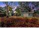 Spacious backyard with mature trees, providing privacy for the home at 8537 Cameo Dr, New Port Richey, FL 34654