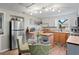 Bright kitchen featuring stainless steel appliances, butcher block countertops, and white cabinets at 8537 Cameo Dr, New Port Richey, FL 34654