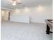 Expansive bonus room area with carpet flooring, recessed lighting, and plenty of space for entertainment at 11307 Linden Depot Rd, San Antonio, FL 33576