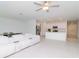 Bright, open-concept living area flowing into the modern kitchen, perfect for entertaining and relaxing at 11307 Linden Depot Rd, San Antonio, FL 33576