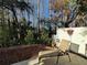 Inviting backyard with a chair and patio at 12411 Cavalier Ct, Hudson, FL 34669
