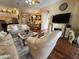 Inviting living room with hardwood floors, fireplace, and modern décor at 12411 Cavalier Ct, Hudson, FL 34669