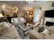 Comfortable living room with hardwood floors and ample natural light at 12411 Cavalier Ct, Hudson, FL 34669
