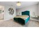 This bedroom features a designer headboard, and modern art at 12854 Boggy Creek Dr, Riverview, FL 33579
