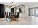 Dining room with contemporary lighting and decor at 12854 Boggy Creek Dr, Riverview, FL 33579