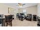 This office features a ceiling fan and two desks at 12854 Boggy Creek Dr, Riverview, FL 33579