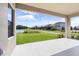 This outdoor patio overlooks a gorgeous lake at 12854 Boggy Creek Dr, Riverview, FL 33579