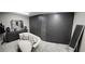 Expansive walk-in closet with custom storage solutions, seating, and full-length mirrors at 12854 Boggy Creek Dr, Riverview, FL 33579