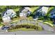 Beautiful aerial view of neighborhood homes showing lush landscaping and well-manicured lawns at 19891 Bridgetown Loop, Venice, FL 34293