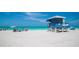 Beach with blue lifeguard hut and beautiful ocean view in a residential community at 19891 Bridgetown Loop, Venice, FL 34293