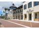 Upscale outdoor shopping center with restaurants and retail shops surrounded by palm trees at 19891 Bridgetown Loop, Venice, FL 34293