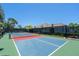 Community pickleball court featuring a blue surface and black fence at 19891 Bridgetown Loop, Venice, FL 34293