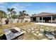 Backyard with stone walkway and patio at 3369 Houle Ave, Sarasota, FL 34232