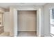Bedroom closet with open bi-fold doors and wire shelving at 3369 Houle Ave, Sarasota, FL 34232
