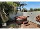 Outdoor Spa situated amongst landscaping and next to a privacy fence at 3369 Houle Ave, Sarasota, FL 34232