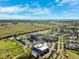 Scenic aerial view of a golf course community with lush green fairways and beautiful landscaping at 2825 Terra Ceia Bay Blvd # 1902, Palmetto, FL 34221