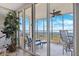 Enjoy serene water views from this delightful balcony with comfortable seating and tile floors at 2825 Terra Ceia Bay Blvd # 1902, Palmetto, FL 34221