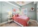 Well-lit bedroom with a cozy bed, shuttered windows, and coastal themed decorations at 2825 Terra Ceia Bay Blvd # 1902, Palmetto, FL 34221