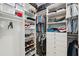 Walk-in closet with custom shelving, hanging racks, and drawers, providing ample storage space at 2825 Terra Ceia Bay Blvd # 1902, Palmetto, FL 34221