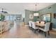 Open-concept dining area with water views, with tile flooring and access to the living room at 2825 Terra Ceia Bay Blvd # 1902, Palmetto, FL 34221