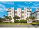 Elegant condo building featuring well-maintained landscaping and a welcoming entrance sign at 2825 Terra Ceia Bay Blvd # 1902, Palmetto, FL 34221