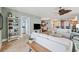 Bright living room with neutral furniture, tile flooring, and an open layout leading to other living spaces at 2825 Terra Ceia Bay Blvd # 1902, Palmetto, FL 34221