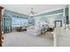 Bright bedroom offers a cozy sitting area, scenic views, and ample natural light at 2825 Terra Ceia Bay Blvd # 1902, Palmetto, FL 34221