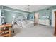 Serene bedroom featuring soft blue walls, neutral-toned furniture, and ample natural light at 2825 Terra Ceia Bay Blvd # 1902, Palmetto, FL 34221