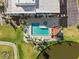 Aerial view showcasing a stunning swimming pool with ample seating and poolside pavilion at 2825 Terra Ceia Bay Blvd # 1902, Palmetto, FL 34221
