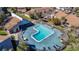 Community pool boasts crystal clear water surrounded by lounge chairs, creating a relaxing atmosphere at 6311 Newtown Cir # 11B1, Tampa, FL 33615