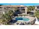 Enjoy the outdoor community pool with seating near the balconies for a resort-style experience at 6311 Newtown Cir # 11B1, Tampa, FL 33615