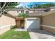 Inviting townhouse featuring a one car garage, neutral paint, and well-maintained landscaping at 8907 Casablanca Way, Tampa, FL 33626