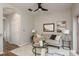 Cozy living room with a comfortable sofa, stylish decor, and an overhead fan at 8907 Casablanca Way, Tampa, FL 33626
