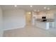 Bright kitchen with white cabinets and stainless steel appliances at 13290 Ogden Glade Rd, Dade City, FL 33525