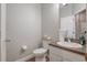 This bathroom includes modern vanity, a toilet and a towel rack at 6020 Kestrel Point Ave, Lithia, FL 33547