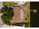 Aerial view showcasing a waterfront home with a private dock, nestled in a charming neighborhood at 9439 Sun Isle Ne Dr, St Petersburg, FL 33702