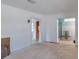 Spacious, unfinished room with multiple doorways leading to other areas of the house at 9439 Sun Isle Ne Dr, St Petersburg, FL 33702