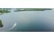 Aerial view of boat cruising across the beautiful waterways, highlighting the allure of waterfront living at 1022 Canal St, Ruskin, FL 33570