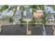Aerial view of home, long dock on the water, and neighboring properties at 1022 Canal St, Ruskin, FL 33570