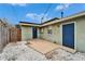 Private backyard features a gravel area, easy access to the house and a secure wooden fence at 1022 Canal St, Ruskin, FL 33570