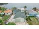 Charming waterfront home featuring a well-maintained yard and convenient garage access at 1022 Canal St, Ruskin, FL 33570