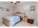 Cozy bedroom with a full-sized bed and matching bedside tables at 19367 Coastal Shore Ter, Land O Lakes, FL 34638